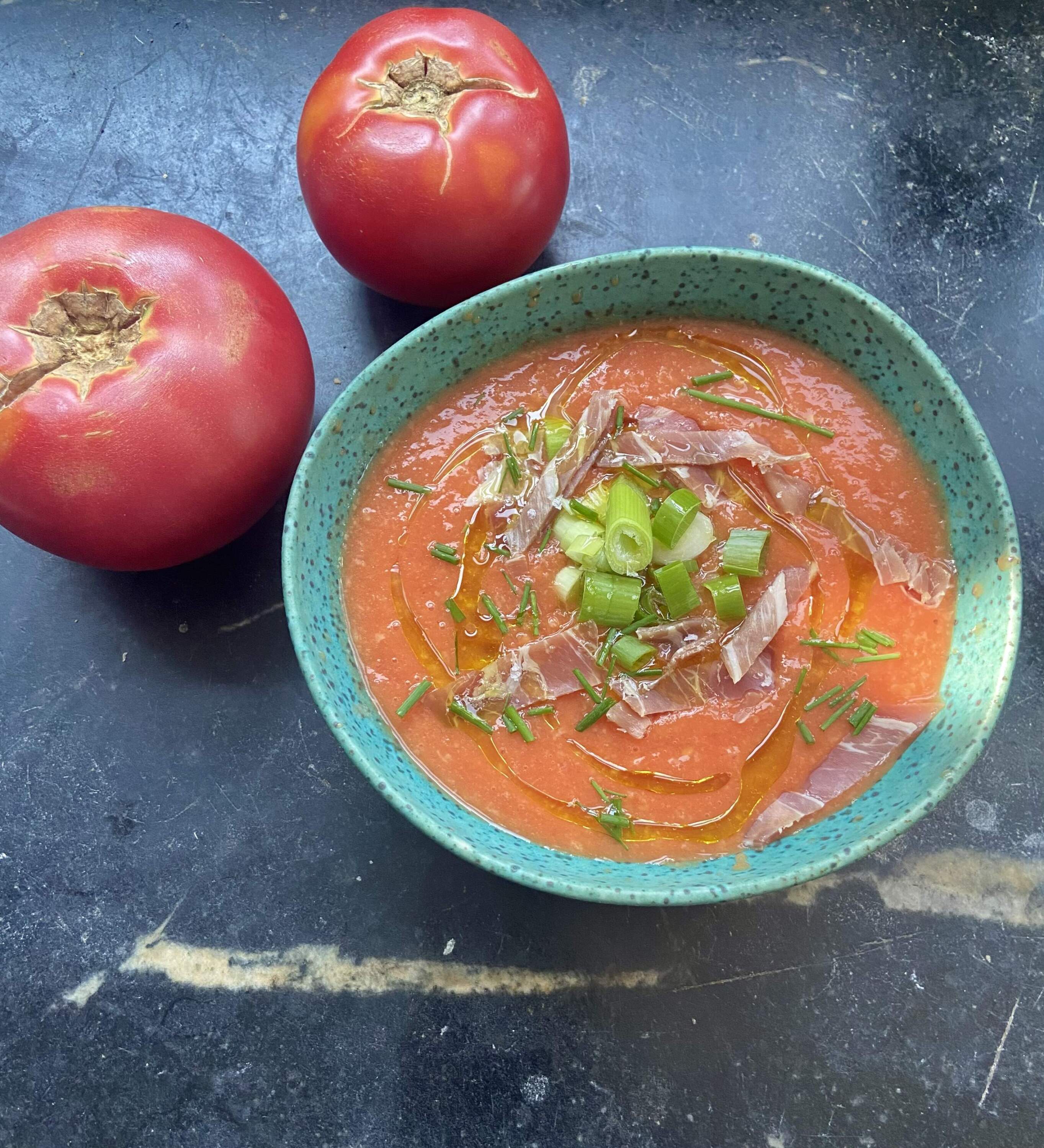 Spanish-style cold tomato soup with toppings. (Kathy Gunst/Here & Now)