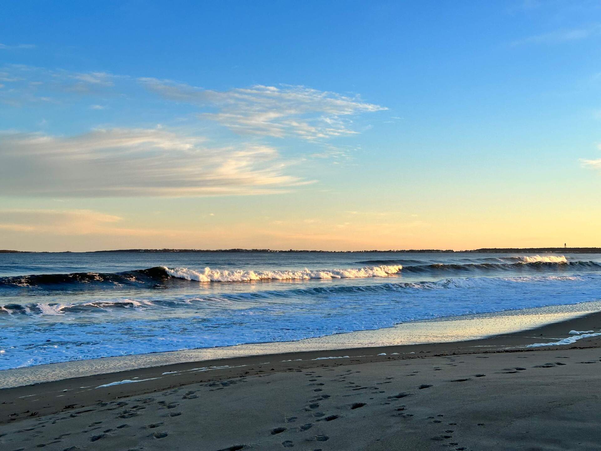 Sunset at Old Orchard Beach, Maine, in June. (Luciana Santerre/Maine Public)