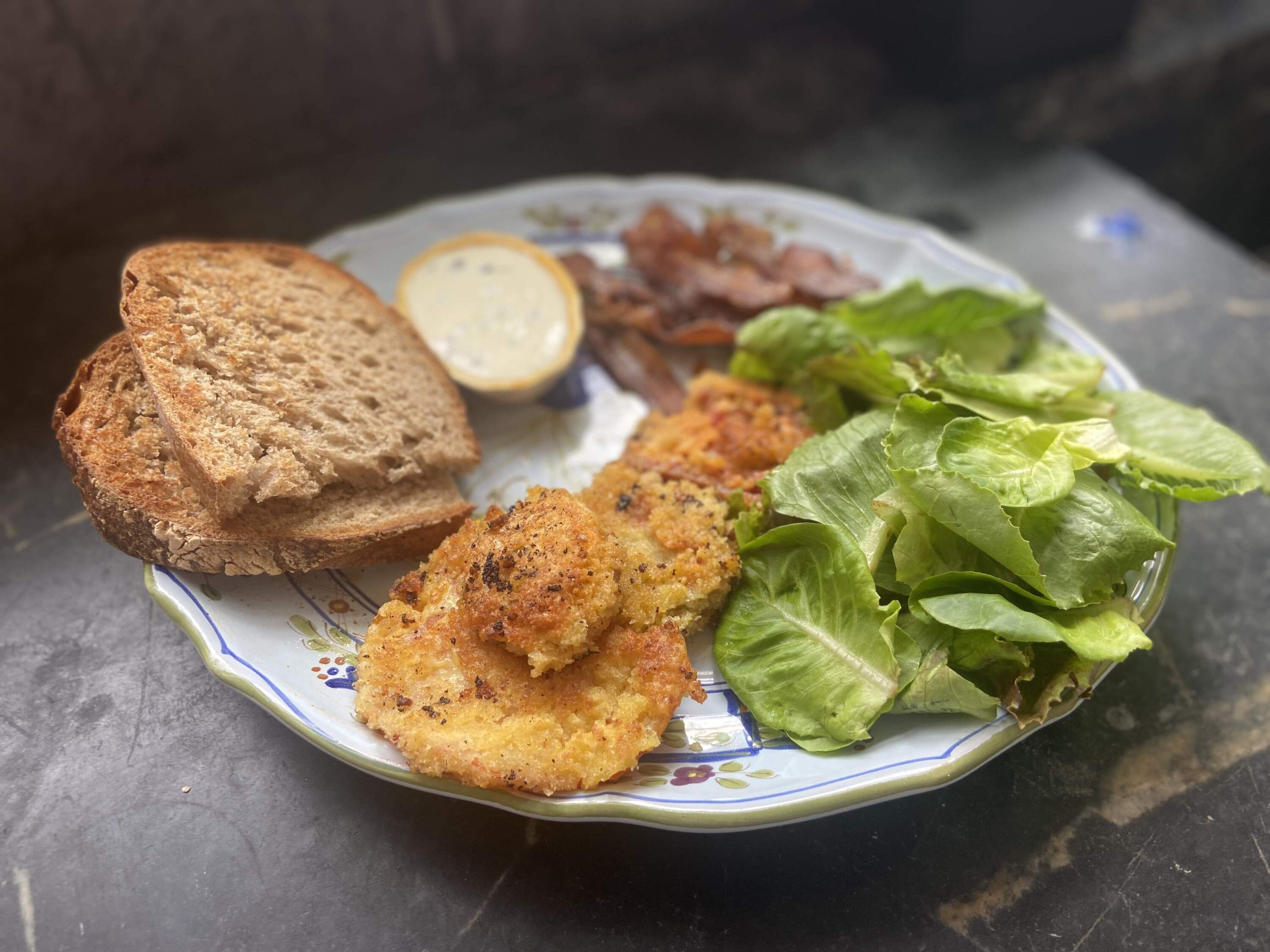 Fried tomato, bacon and lettuce salad. (Kathy Gunst/Here & Now)